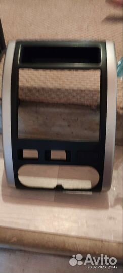 Рамка передней консоли с магнитолой