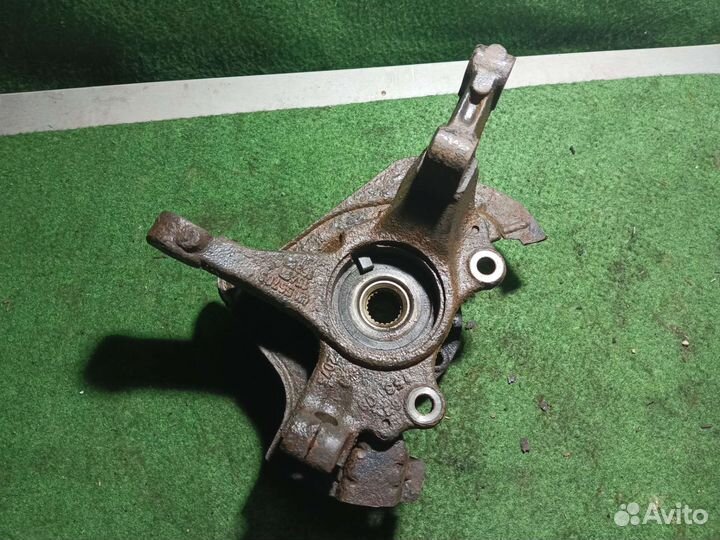 Поворотный кулак левый Опель Корса д