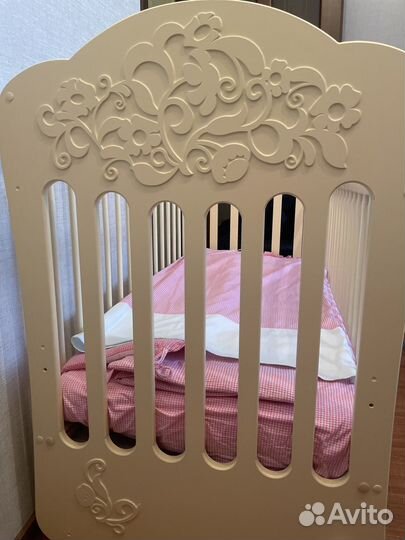 Детская кроватка с поперечным маятником