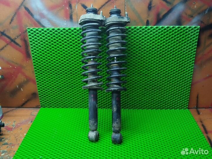 Задние стойки Mitsubishi carisma