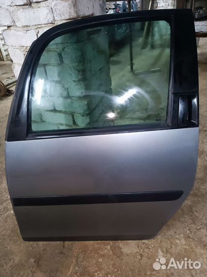 Дверь задняя левая Skoda Roomster