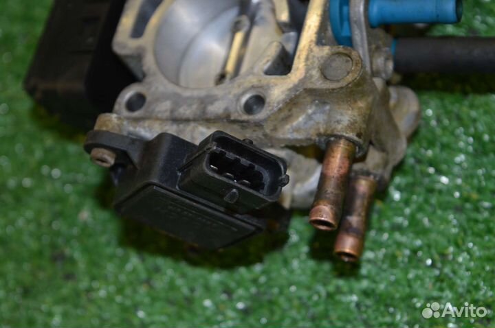 Дроссельная заслонка Opel Astra G