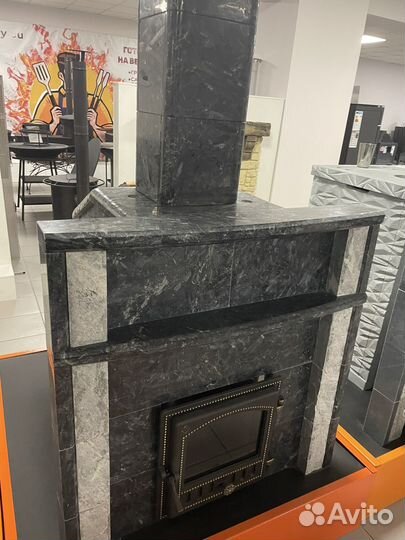 Чугунная печь для бани в облицовке