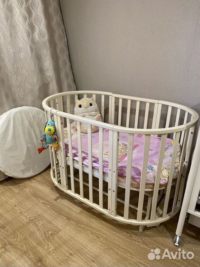 Детская кроватка с маятником круглая