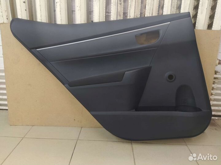 Дверная карта задняя левая Тойота Королла Е 180