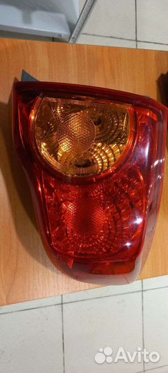 Фонарь задний правый внешний Toyota Corolla E150