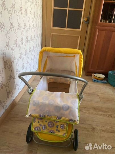 Игрушечная коляска