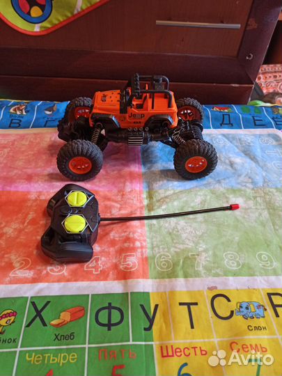 Детская машинка каталка с музыкой