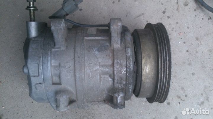 Компрессор кондиционера 92600-85E12