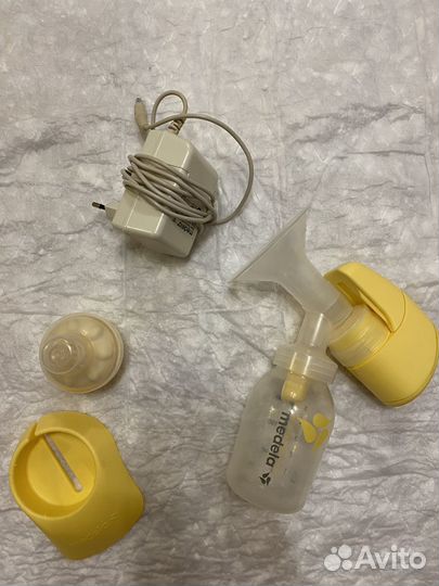 Молокоотсос medela электрический