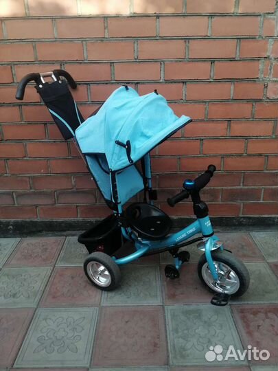 Трехколесный велосипед с ручкой