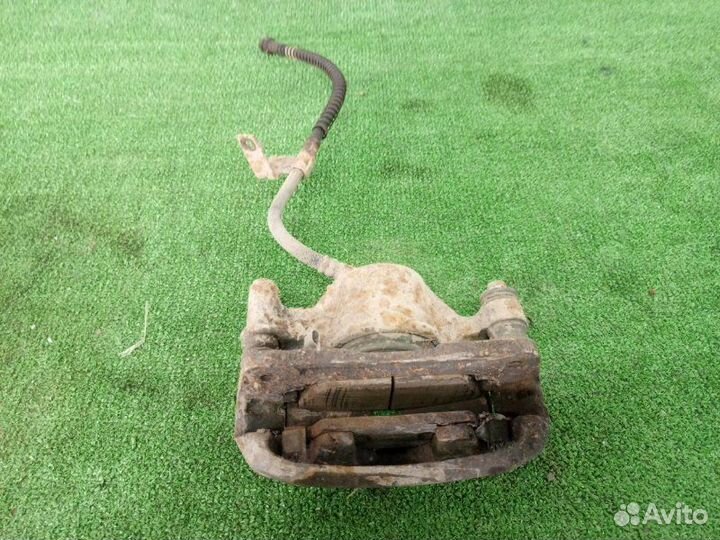 Суппорт тормозной передний левый Hyundai Accent