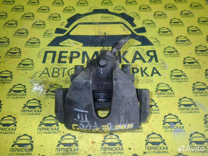 Суппорт тормозной передний левый Ford Focus 3