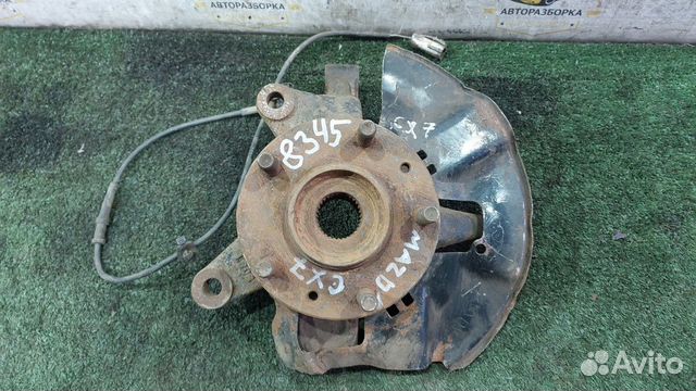 Кулак поворотный передний левый CX-7 2.3