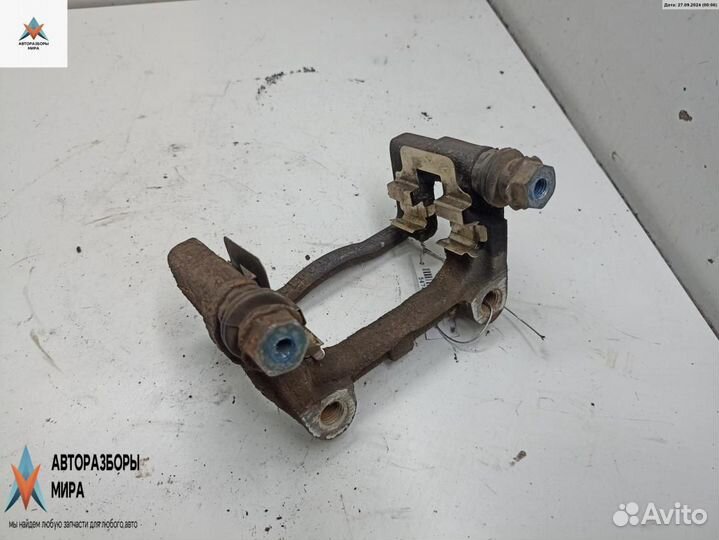 Скоба суппорта Opel Astra H/Family рест. 2009