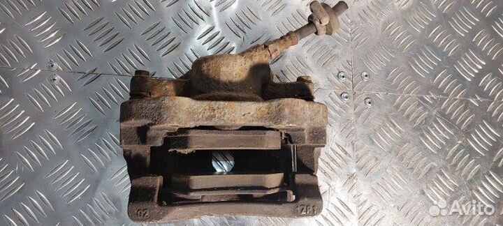 Суппорт тормозной передний левый Chery Bonus A13