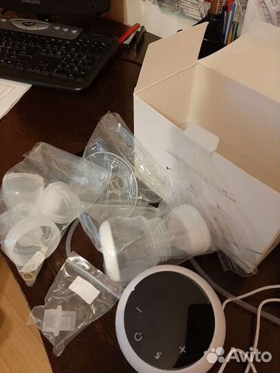 Молокоотсос электрический новый