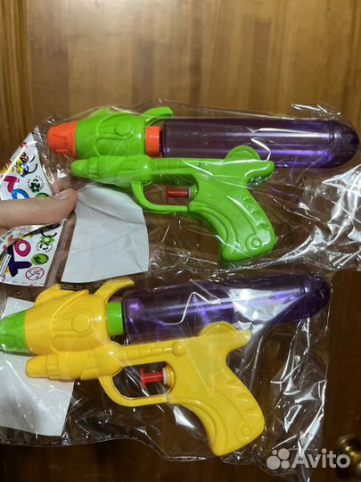 Игрушки лизуны слаймы мелки водные пистолеты новое