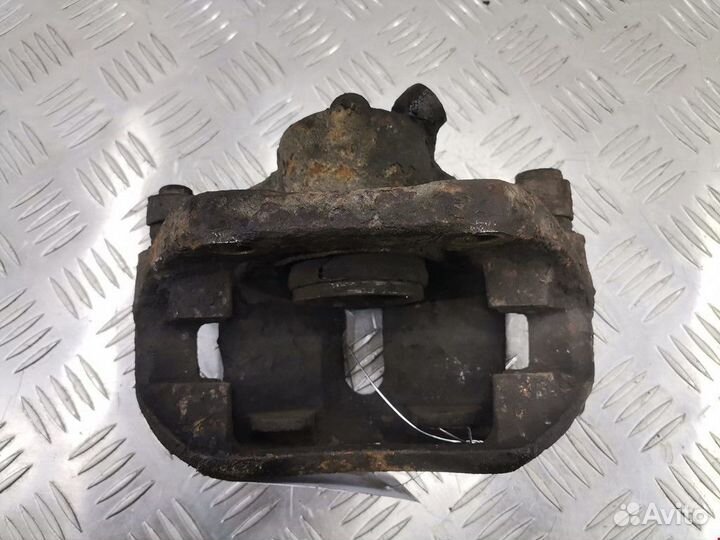 Суппорт передний правый Renault Kangoo рест. 2007