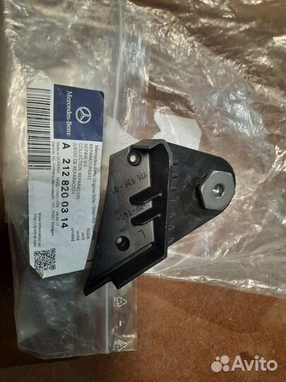 Кронштейн фары левый Mercedes Benz W212