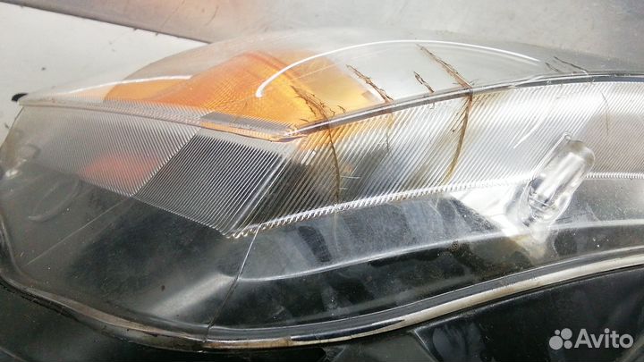 Фара Chrysler Voyager (2007-2010)