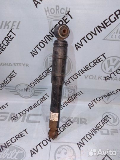 Стойка амортизатор задняя opel Astra H