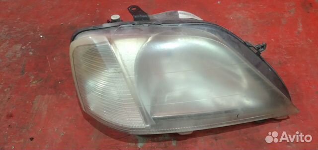 Рено логан фара правая фаза 1