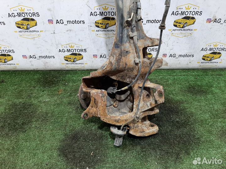 Кулак задний левый Mazda 3 BK седан