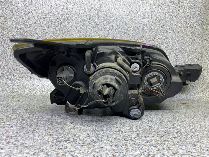 Фара левая Mazda 3 BK 2005