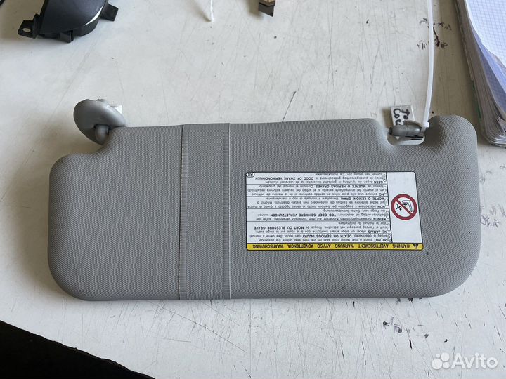 Козырёк солнцезащитный правый Toyota Corolla E150