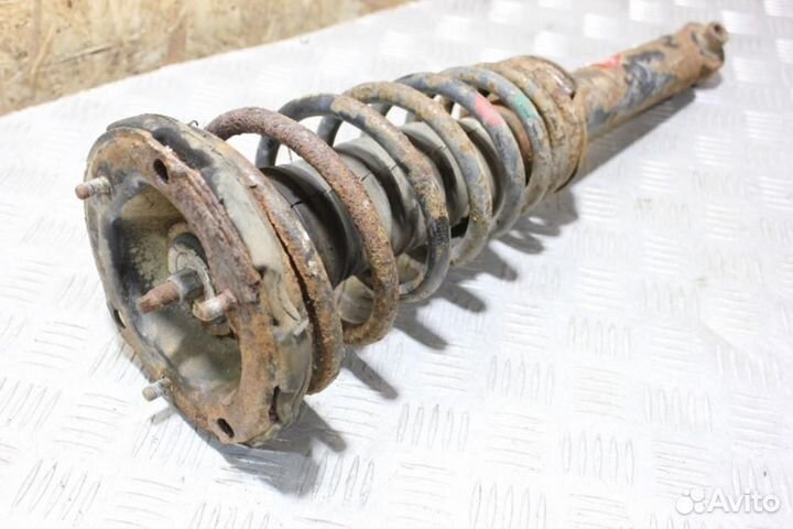 Амортизатор передний левый Nissan Primera 1996 200