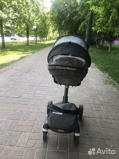 Коляска Doux Bebe