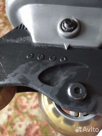 Роликовые коньки