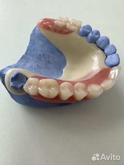 Зубной техник