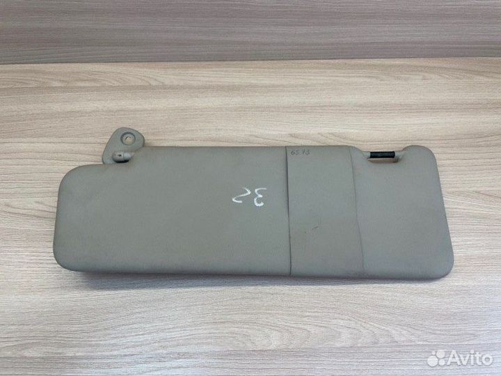 Козырек солнцезащитный левый Renault Logan