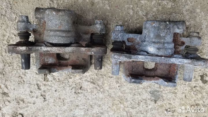 Суппорт mitsubishi lancer