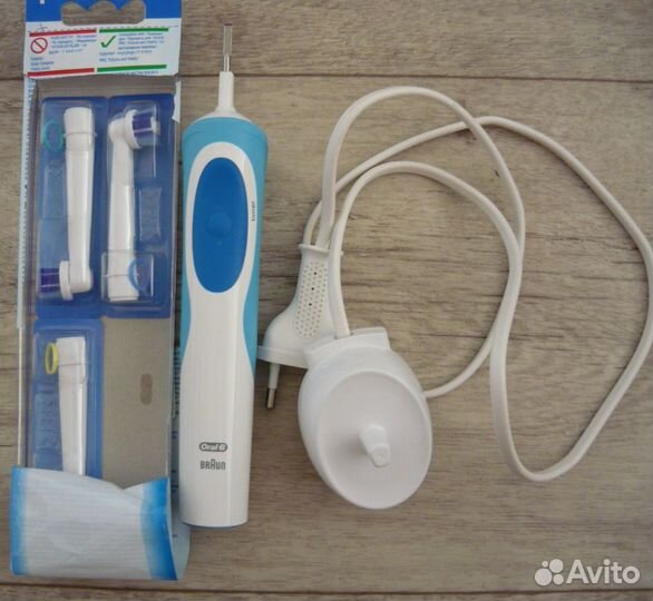 Электрическая зубная щетка braun oral b