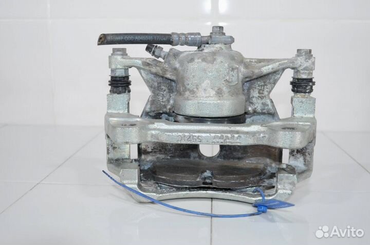 Суппорт тормозной передний левый Volkswagen Golf 7