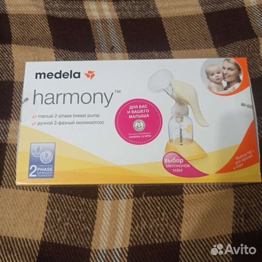 Молокоотсос medela ручной