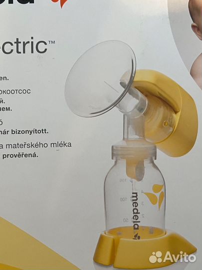 Молокоотсос medela электрический