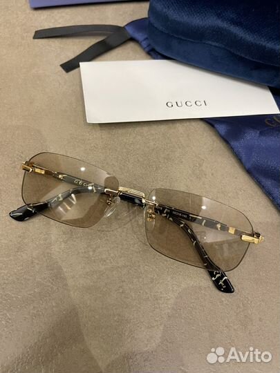 Солнцезащитные очки Gucci