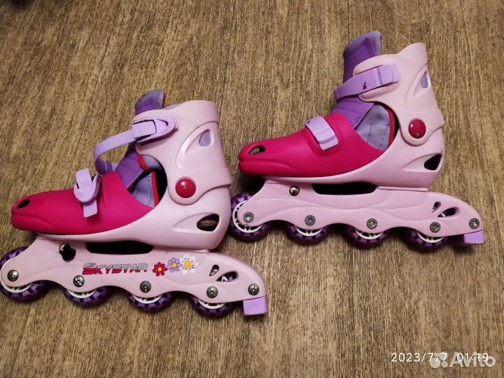 Роликовые коньки