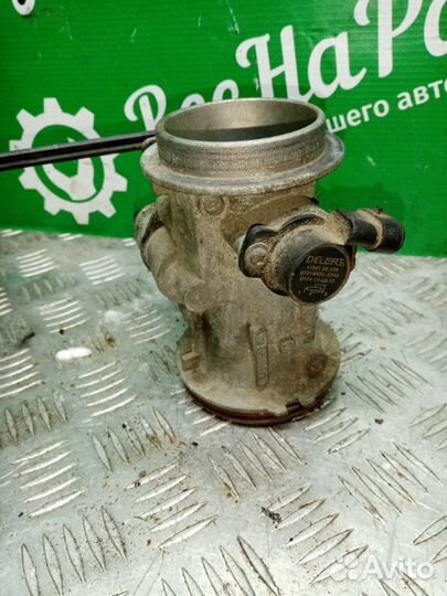 Дроссельная заслонка Renault Logan