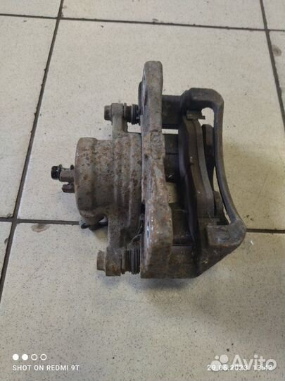 Суппорт тормозной передний левый Chevrolet Lacetti