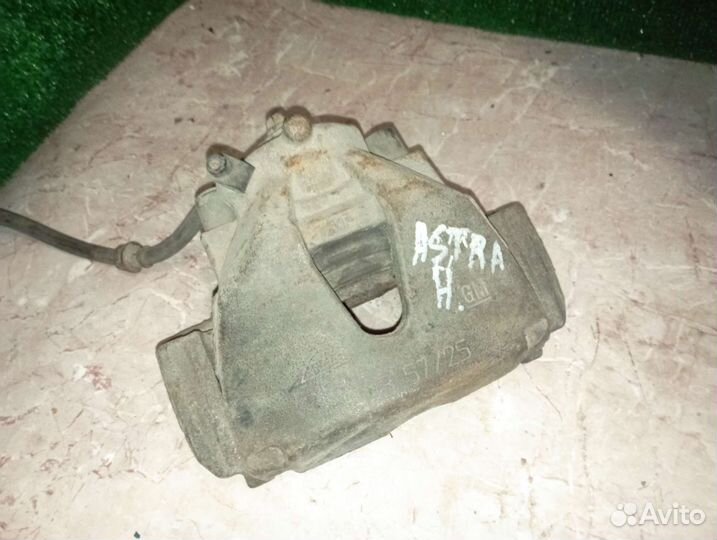 Суппорт тормозной передний левый Opel Astra H