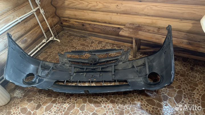 Передний бампер мазда трибют