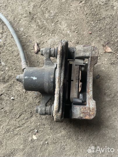 Суппорт задний правый Kia Sportage 3