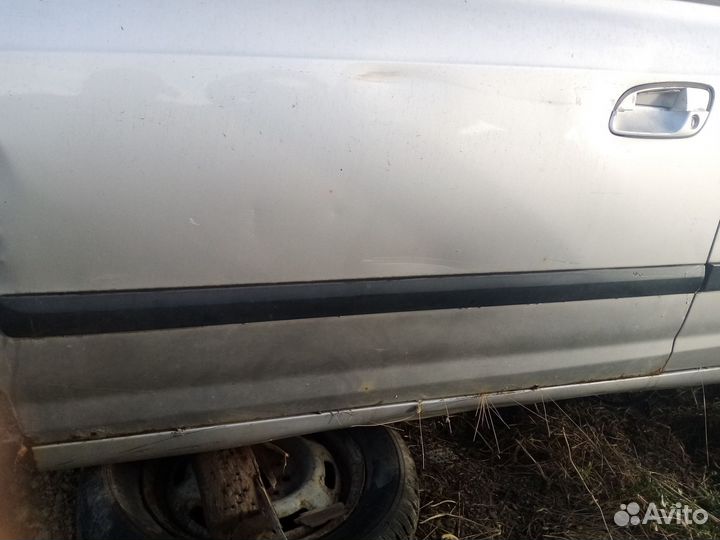 Дверь передняя левая Hyundai Elantra 3 XD