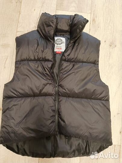 Женская жилетка