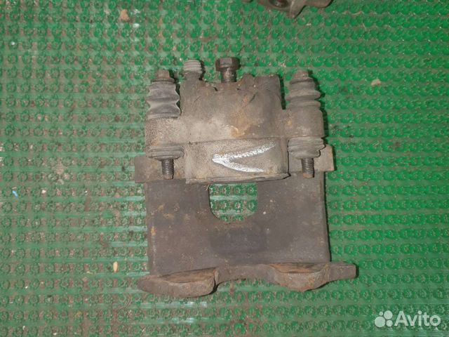 Суппорт тормозной передний Крайслер Вояджер 3